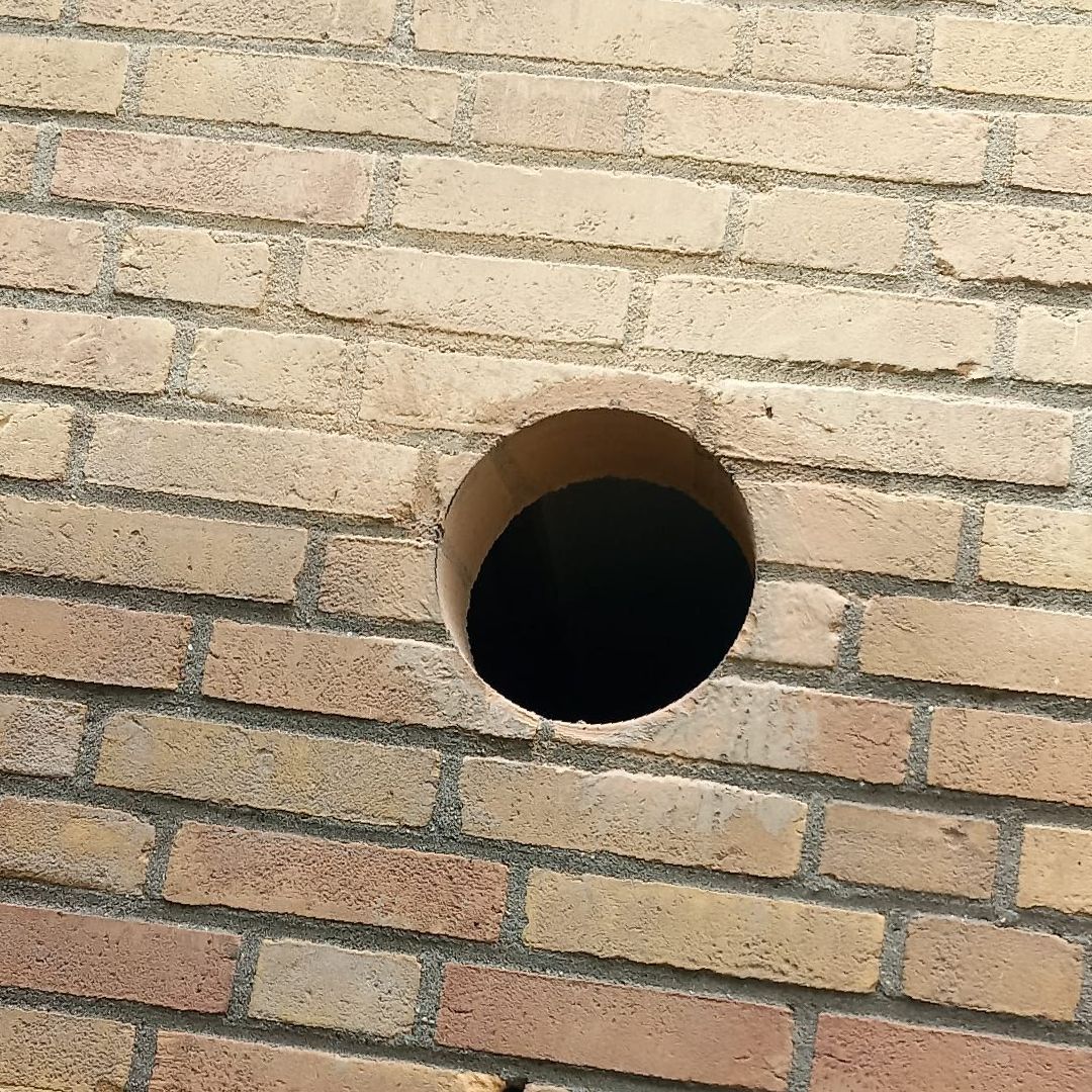 Gat in muur boren